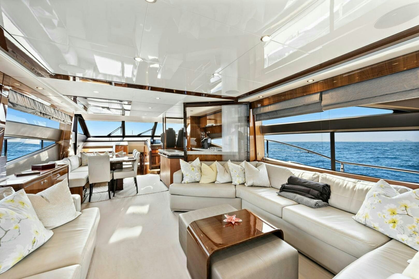 a living room with a large window aboard LA-Z-BUOY Yacht for Sale