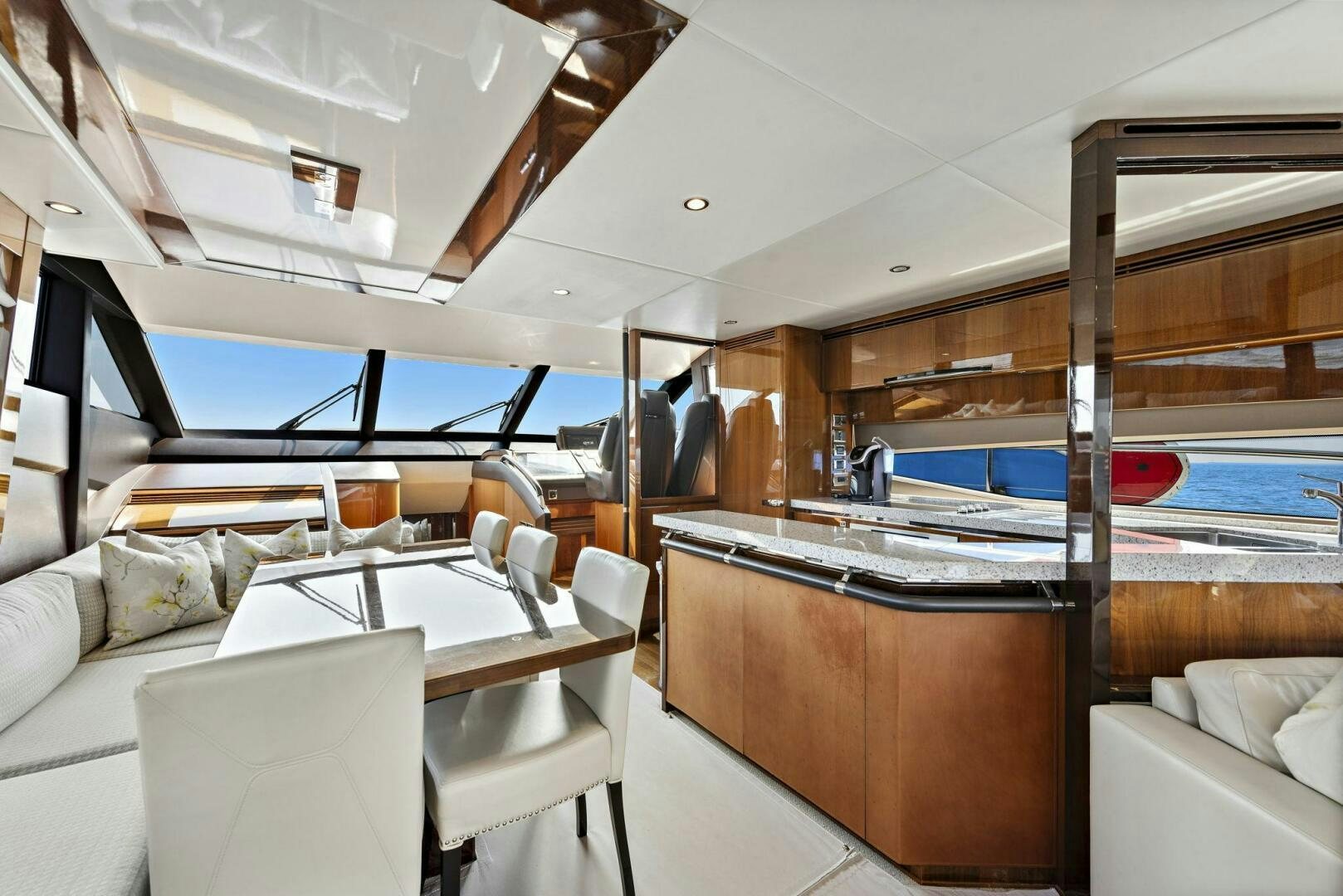 a boat with a table and chairs aboard LA-Z-BUOY Yacht for Sale