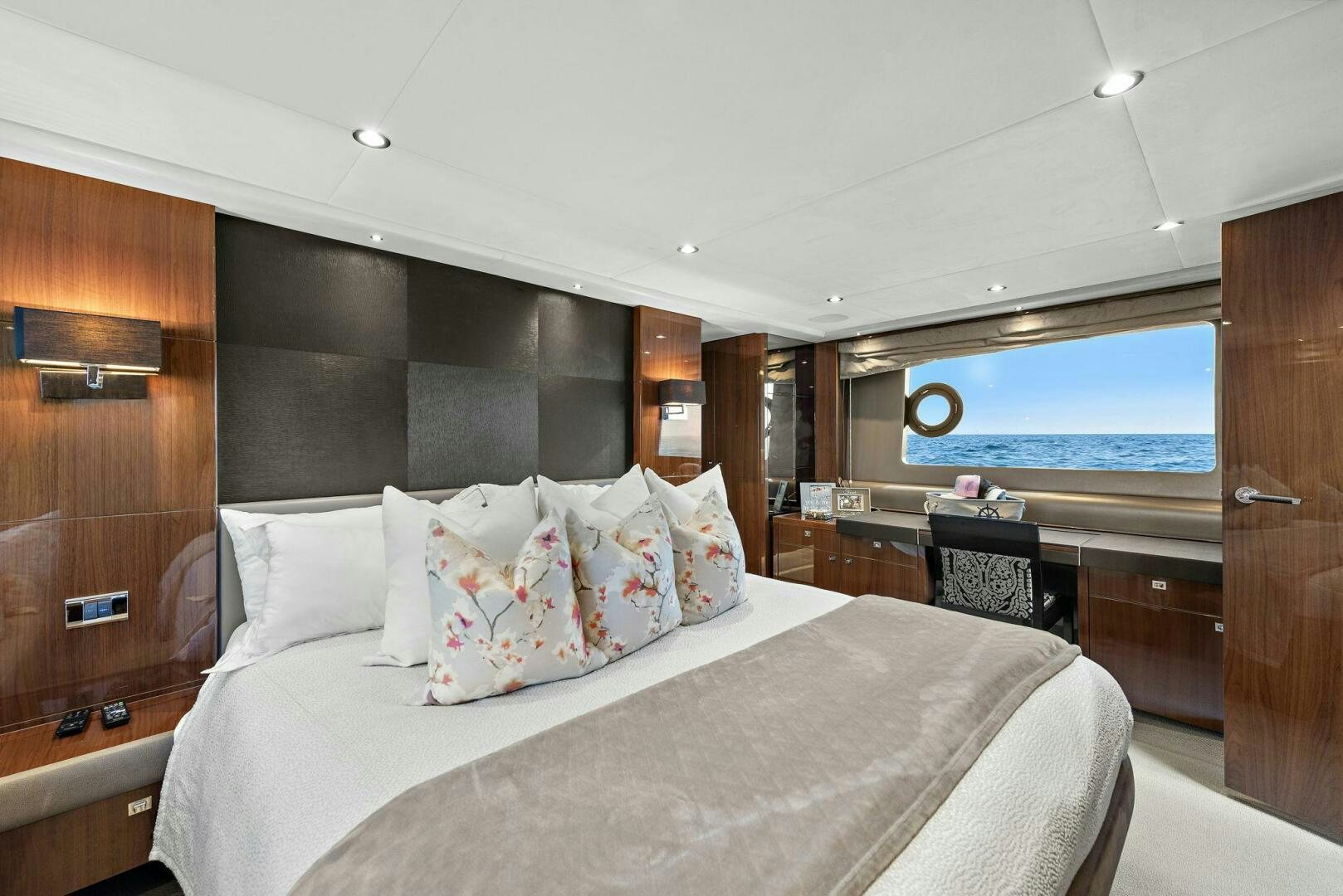 a bed with white sheets aboard LA-Z-BUOY Yacht for Sale