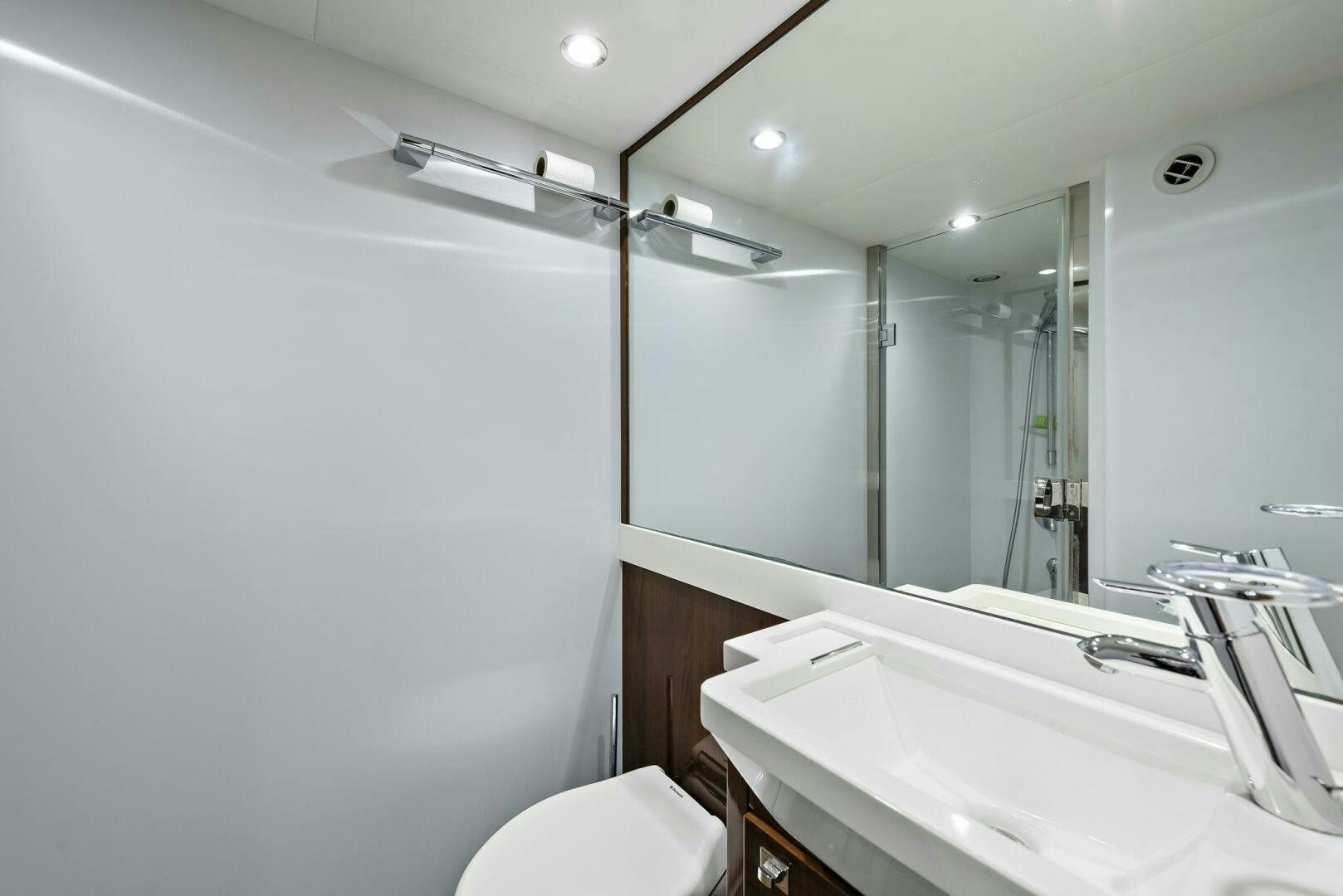 a bathroom with a large mirror aboard LA-Z-BUOY Yacht for Sale
