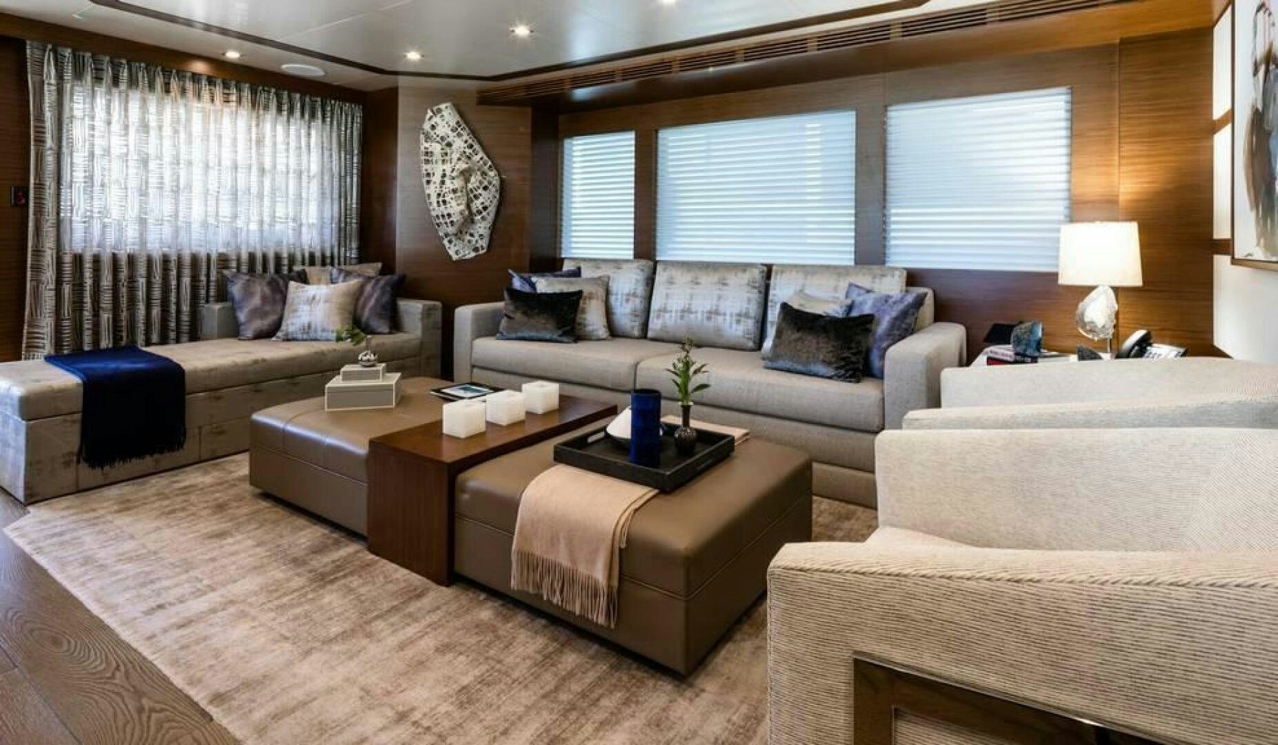 a living room with a couch and a coffee table aboard NORTHLAND Yacht for Sale