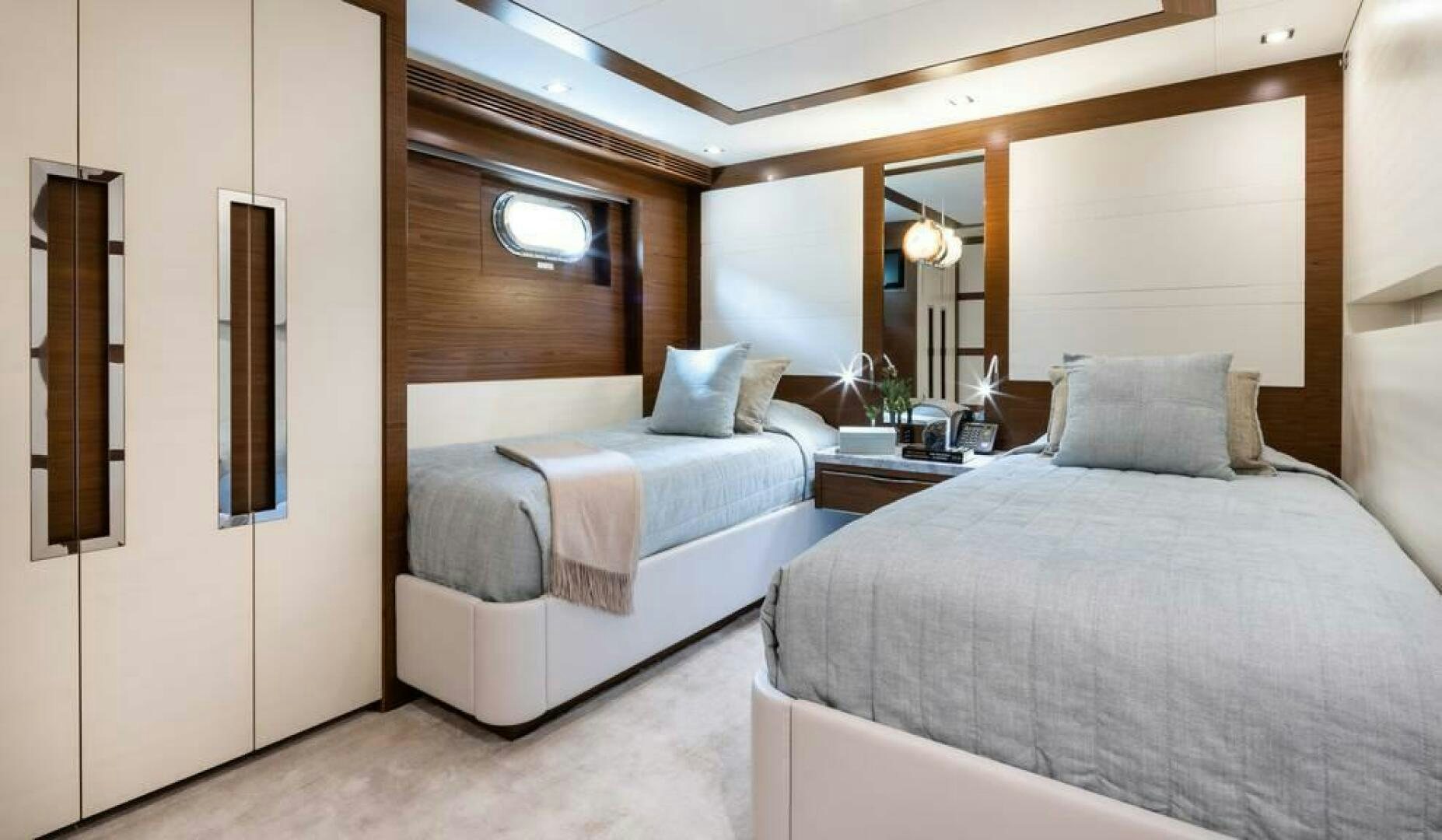 a room with two beds aboard NORTHLAND Yacht for Sale