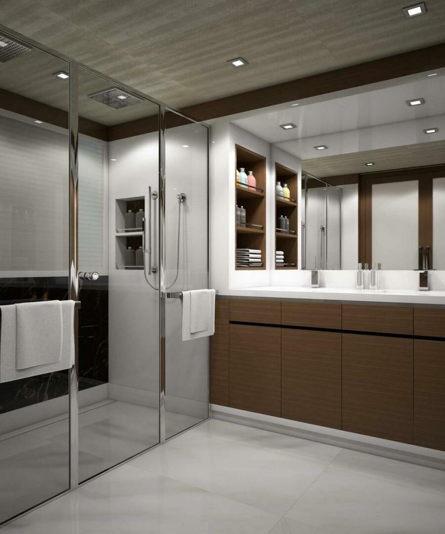a bathroom with a glass shower aboard NORTHLAND Yacht for Sale