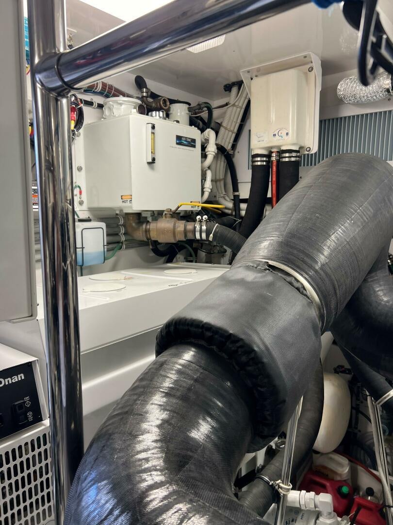 a machine in a room aboard HAPPY HEART Yacht for Sale