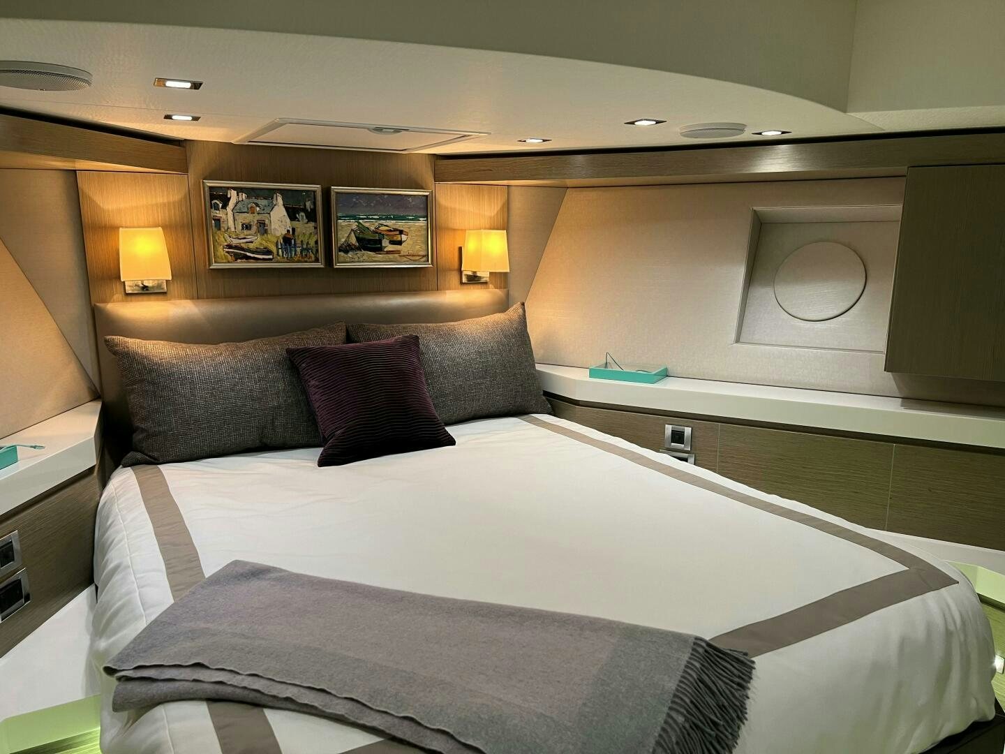 a bed with pillows and pillows aboard HAPPY HEART Yacht for Sale