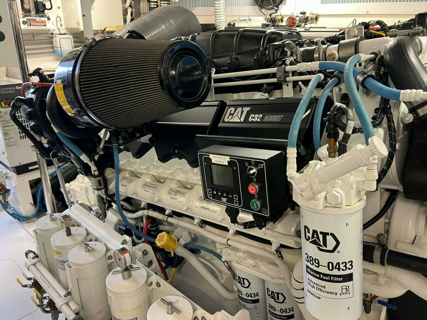 a car engine with a white cylinder aboard HAPPY HEART Yacht for Sale