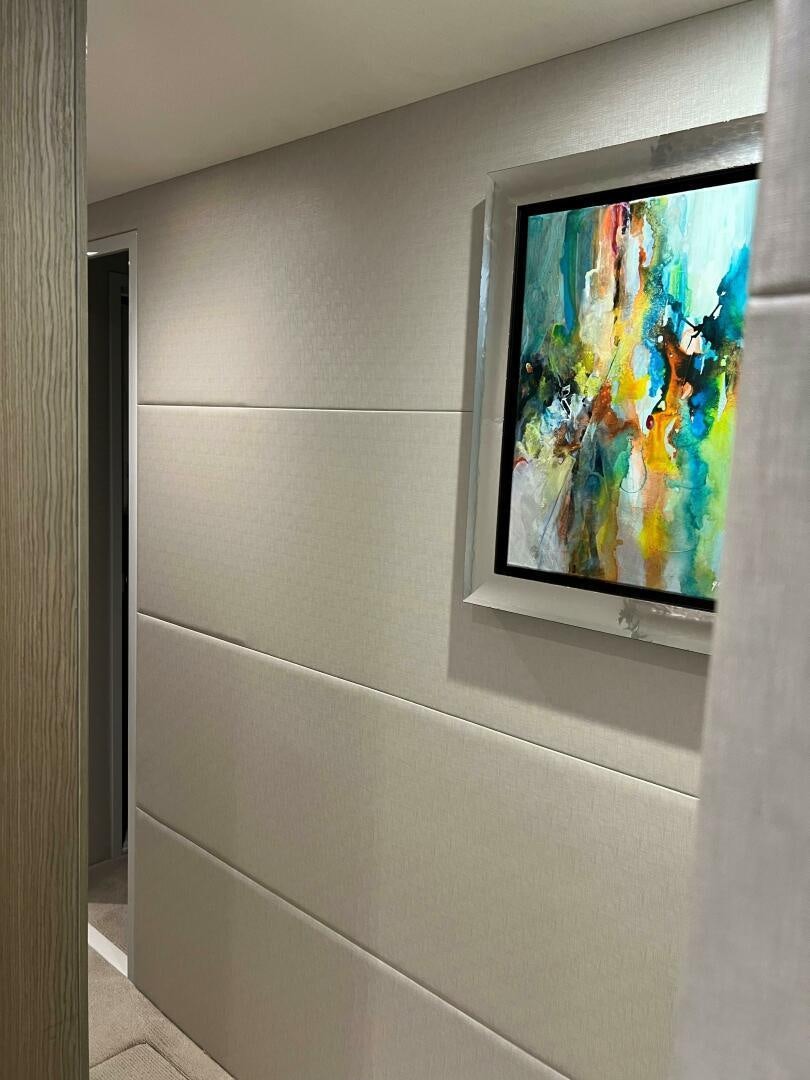 a painting on a wall aboard HAPPY HEART Yacht for Sale