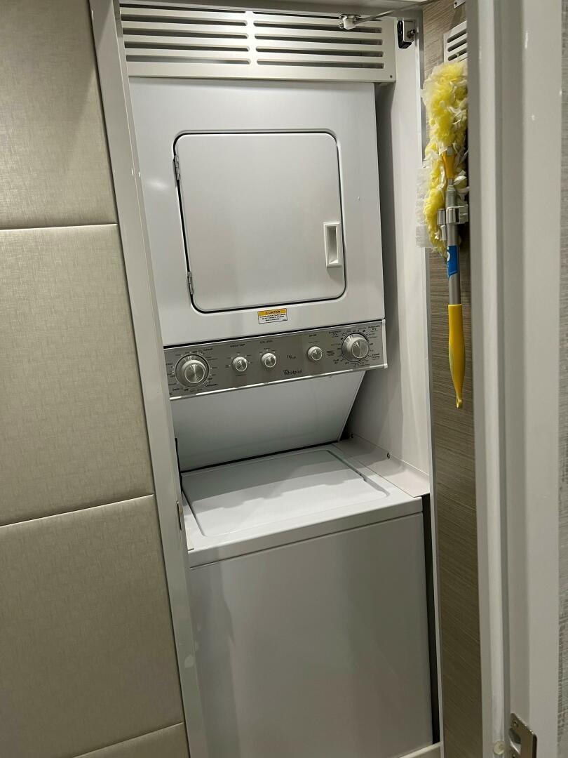 a white microwave oven aboard HAPPY HEART Yacht for Sale