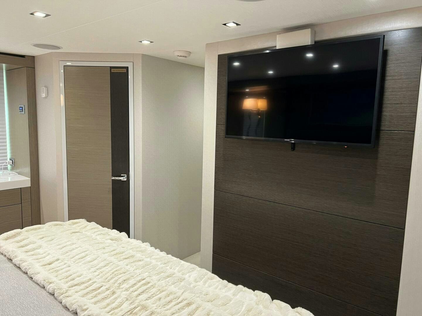 a hotel room with a bed aboard HAPPY HEART Yacht for Sale