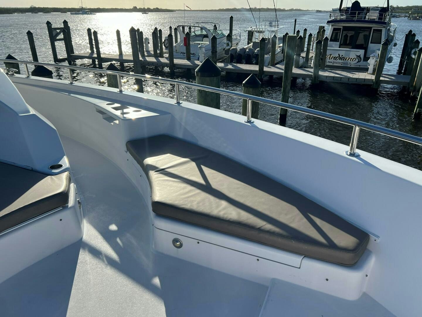 a row of boats in a harbor aboard HAPPY HEART Yacht for Sale
