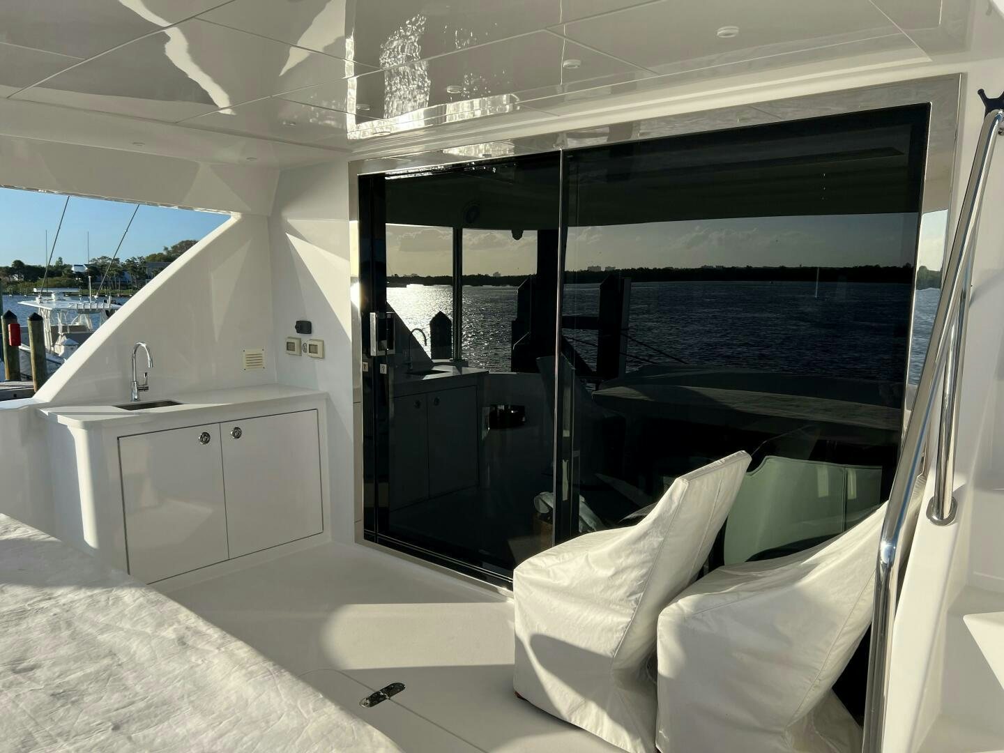 a room with a bed and a sink aboard HAPPY HEART Yacht for Sale