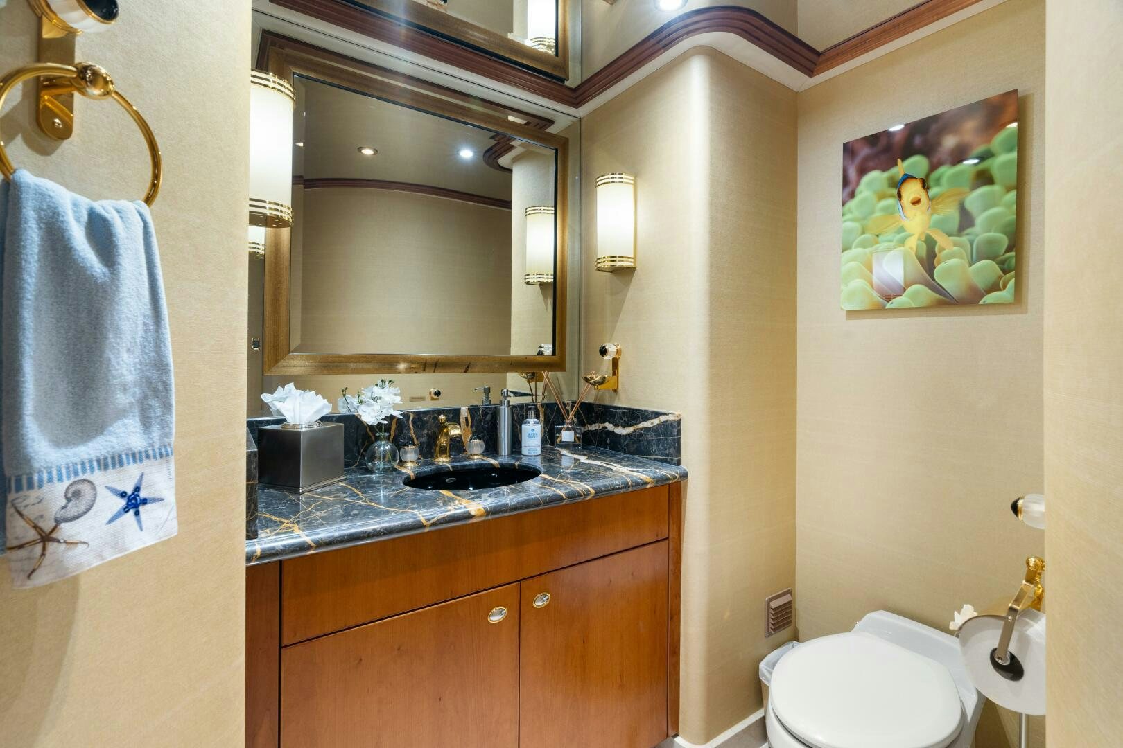 a bathroom with a sink and a mirror aboard ELYSIAN Yacht for Sale