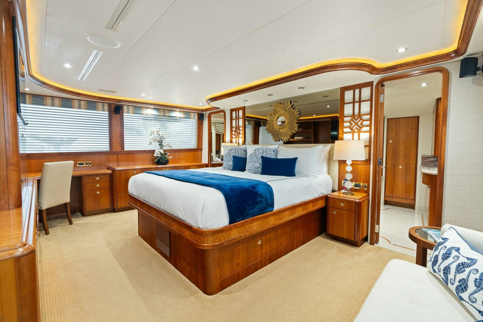 a large bedroom with a large bed aboard ELYSIAN Yacht for Sale