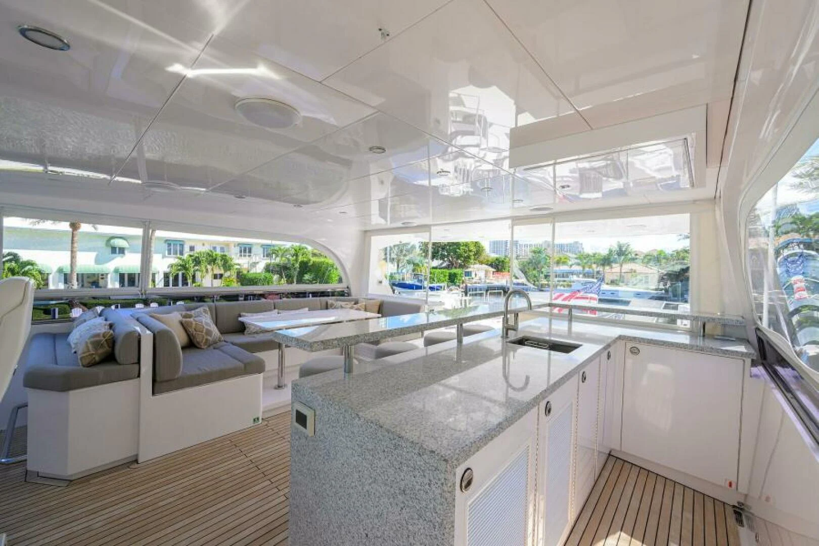 a room with a table and couch aboard JOURNEY Yacht for Sale
