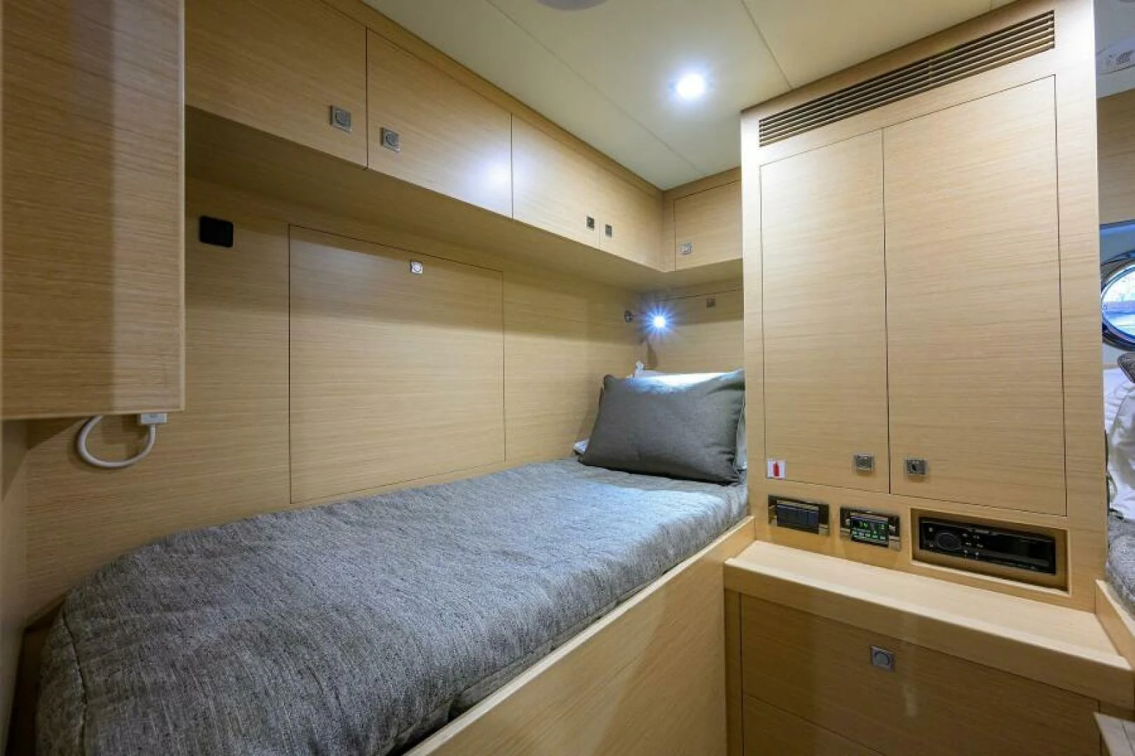 a bed in a room aboard JOURNEY Yacht for Sale