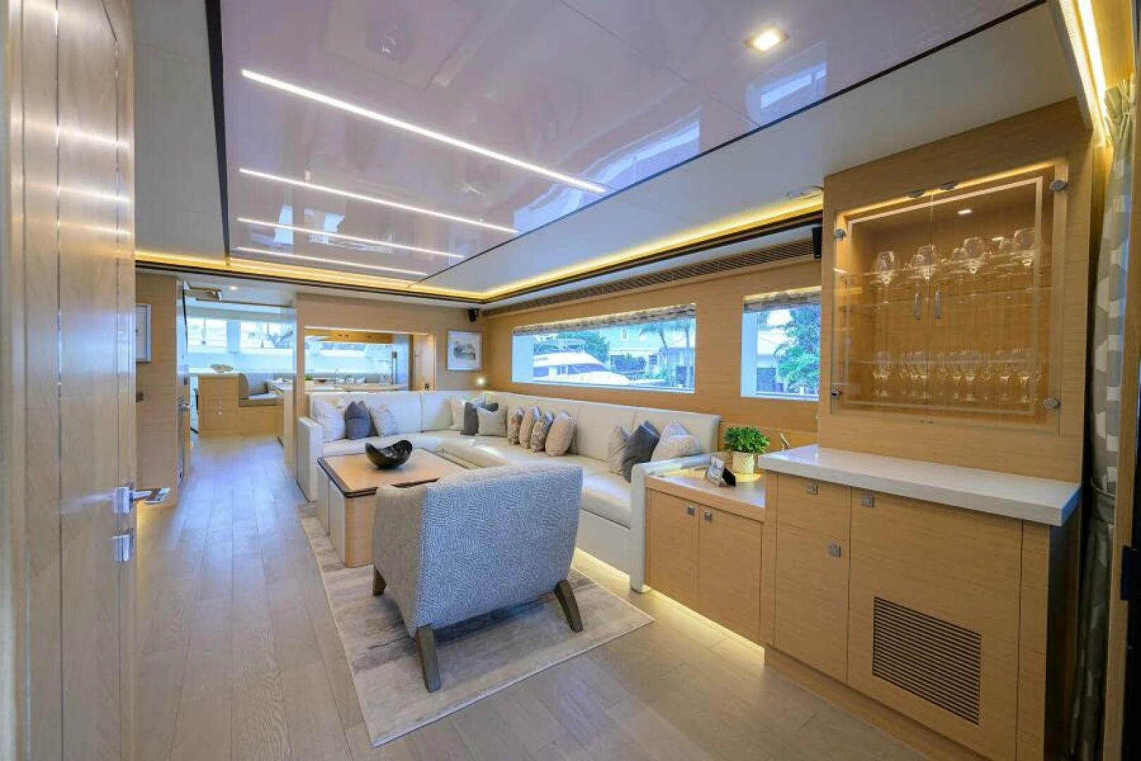a room with a couch and a table aboard JOURNEY Yacht for Sale