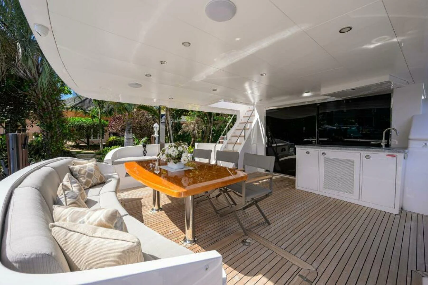a living room with a table and chairs aboard JOURNEY Yacht for Sale