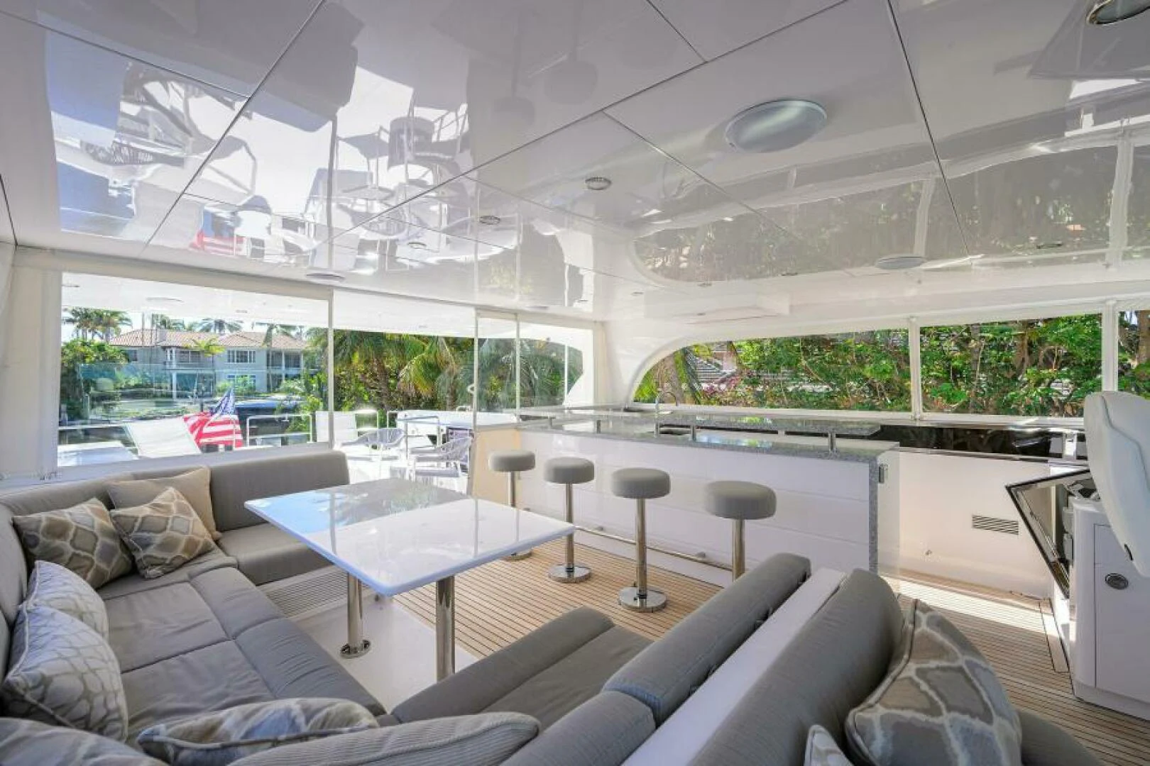 a room with a table and chairs aboard JOURNEY Yacht for Sale