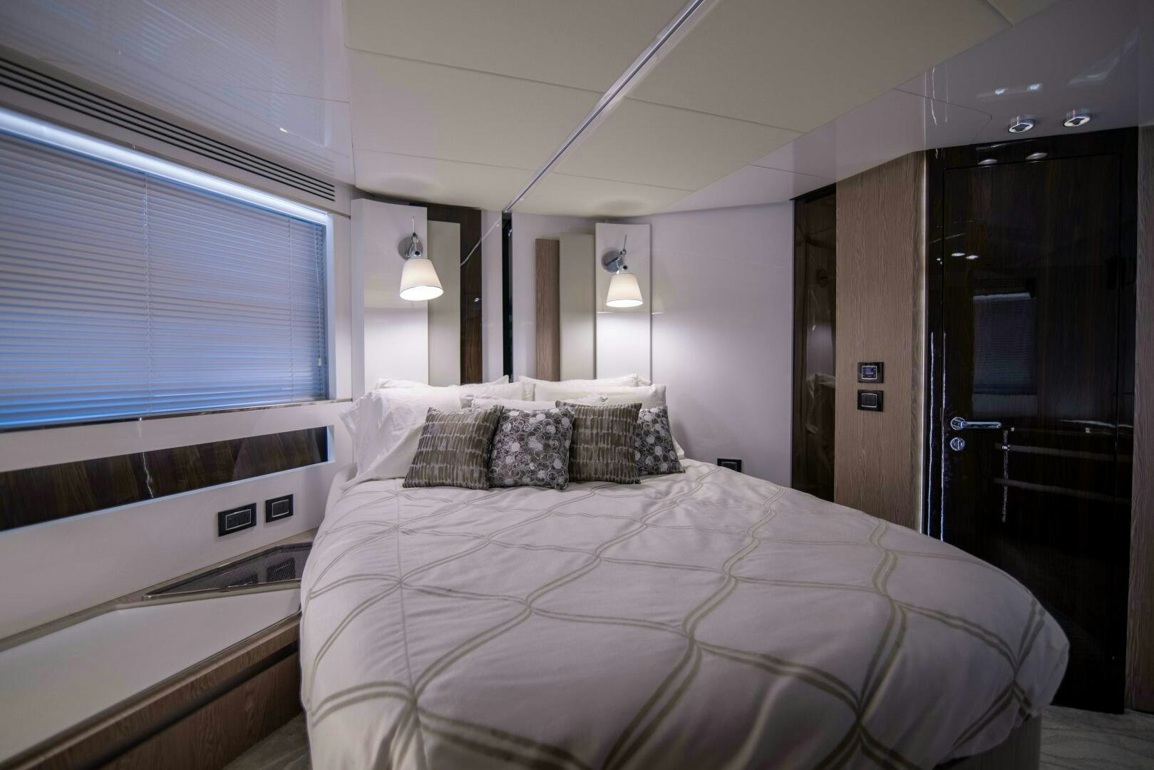 a bed in a room aboard TRIPLE PLAY Yacht for Sale