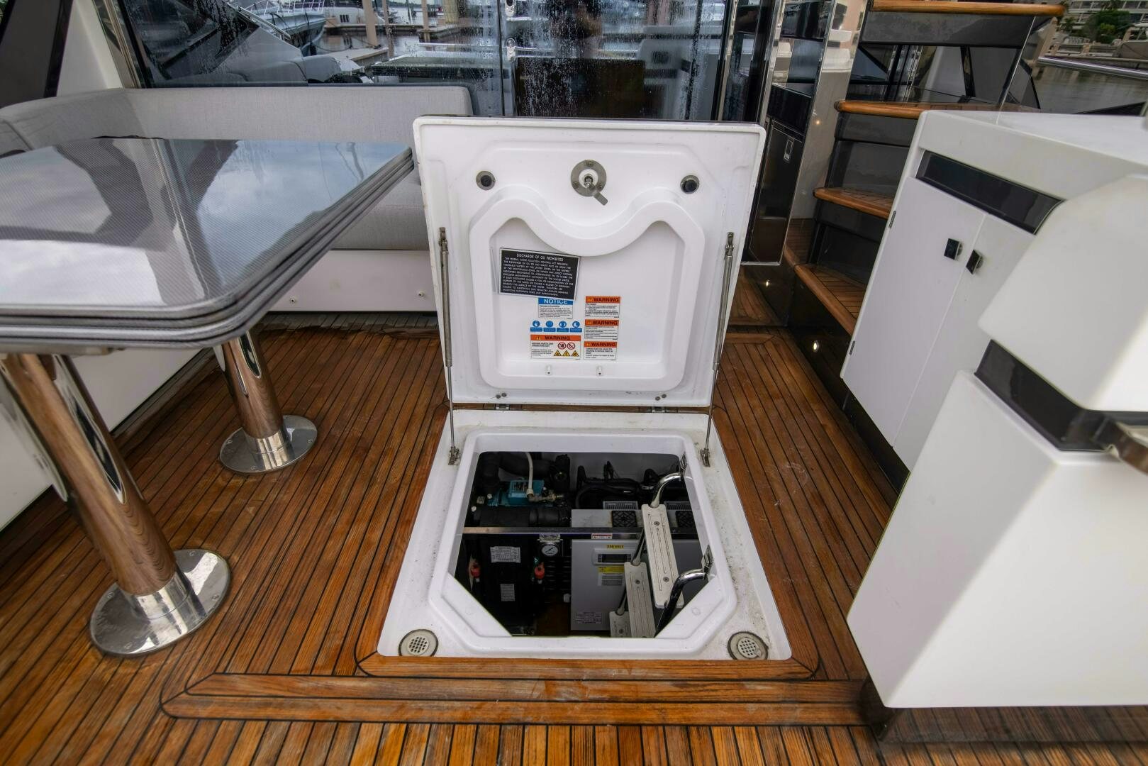 a white machine with a vent aboard TRIPLE PLAY Yacht for Sale