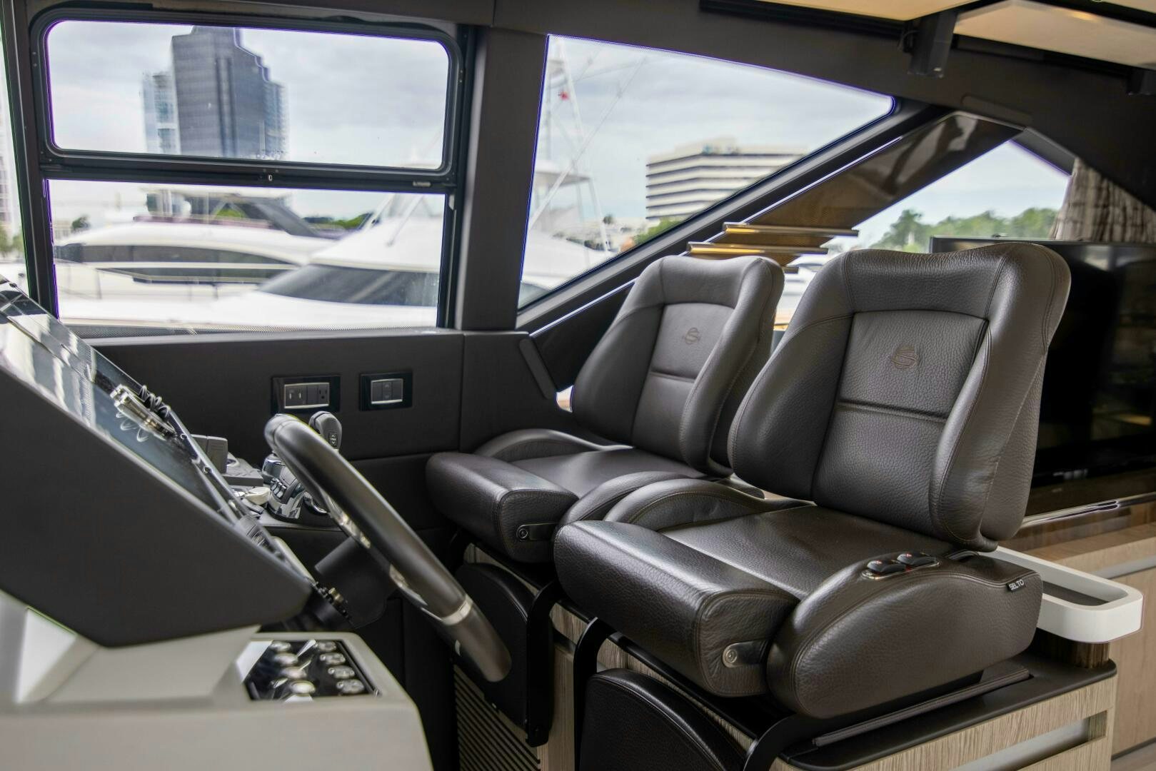 the interior of a car aboard TRIPLE PLAY Yacht for Sale