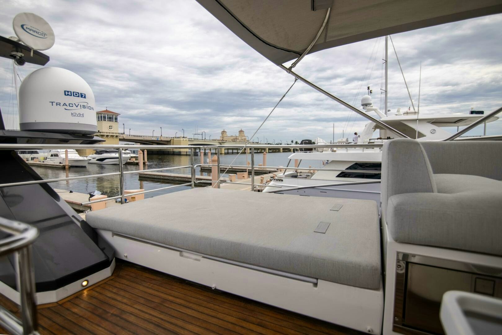a boat with a large white helmet on the deck aboard TRIPLE PLAY Yacht for Sale