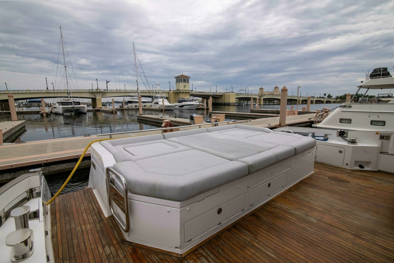a boat docked at a pier aboard TRIPLE PLAY Yacht for Sale