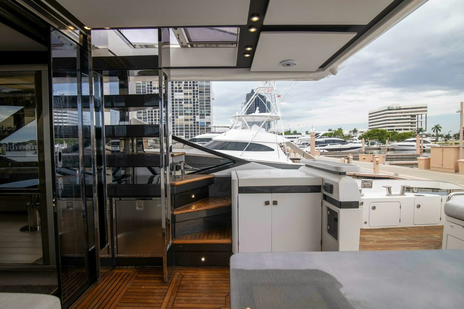 a room with a large glass wall aboard TRIPLE PLAY Yacht for Sale
