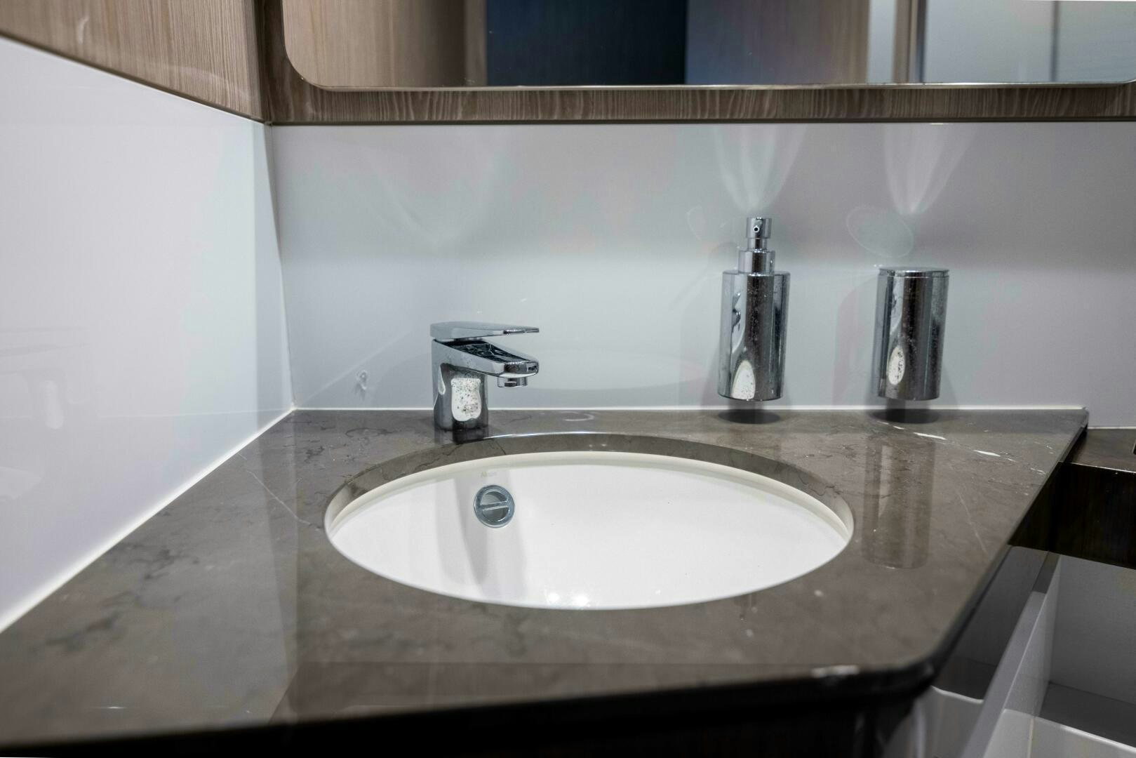 a sink with a faucet aboard TRIPLE PLAY Yacht for Sale
