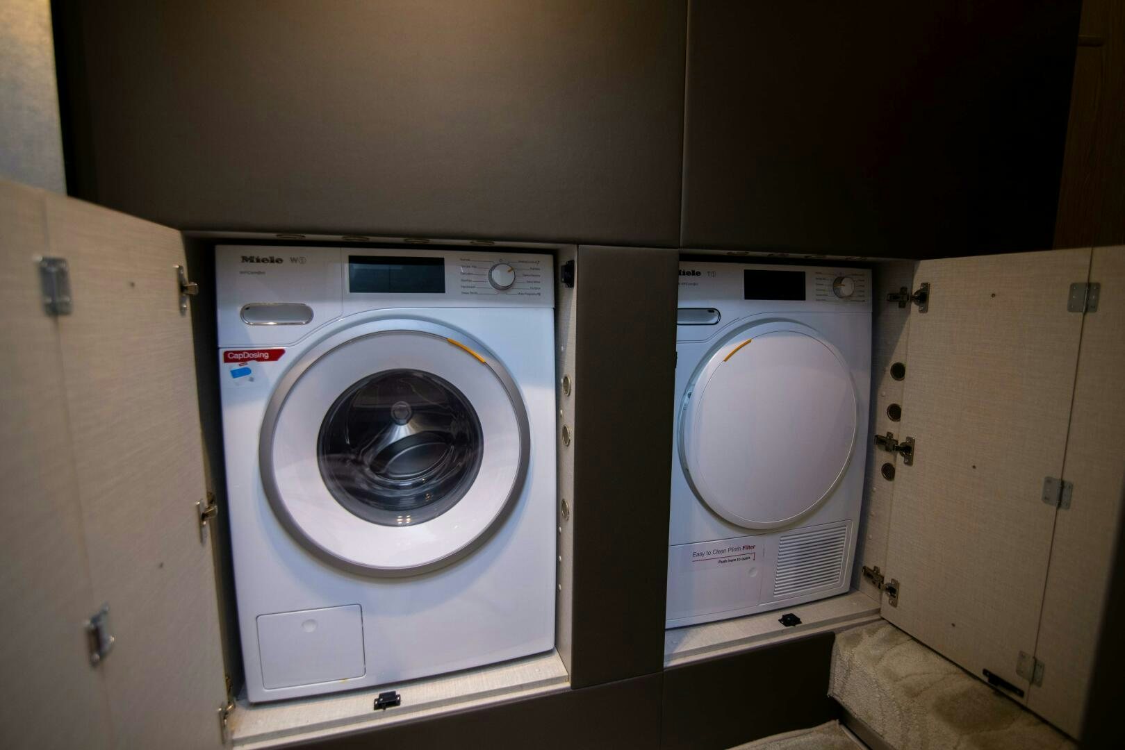 a group of washing machines aboard TRIPLE PLAY Yacht for Sale
