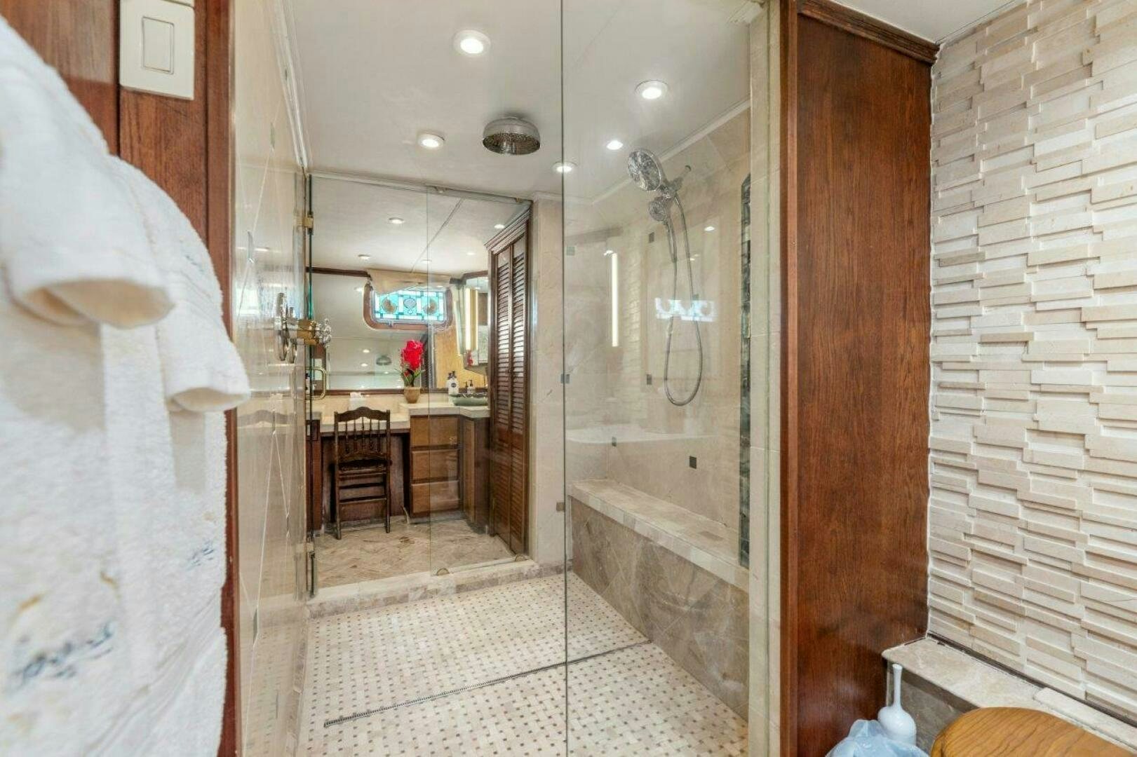 a bathroom with a shower aboard ENVISION Yacht for Sale