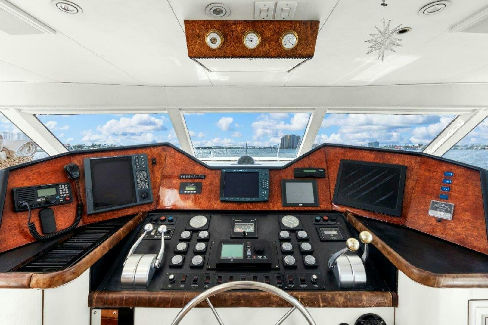 a control panel with a keyboard aboard ENVISION Yacht for Sale