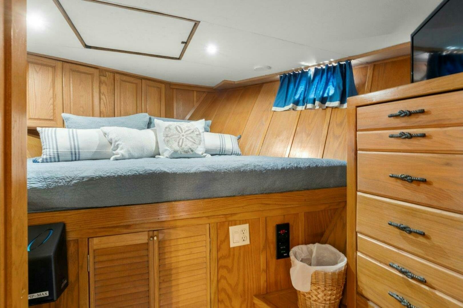 a bed in a room aboard ENVISION Yacht for Sale
