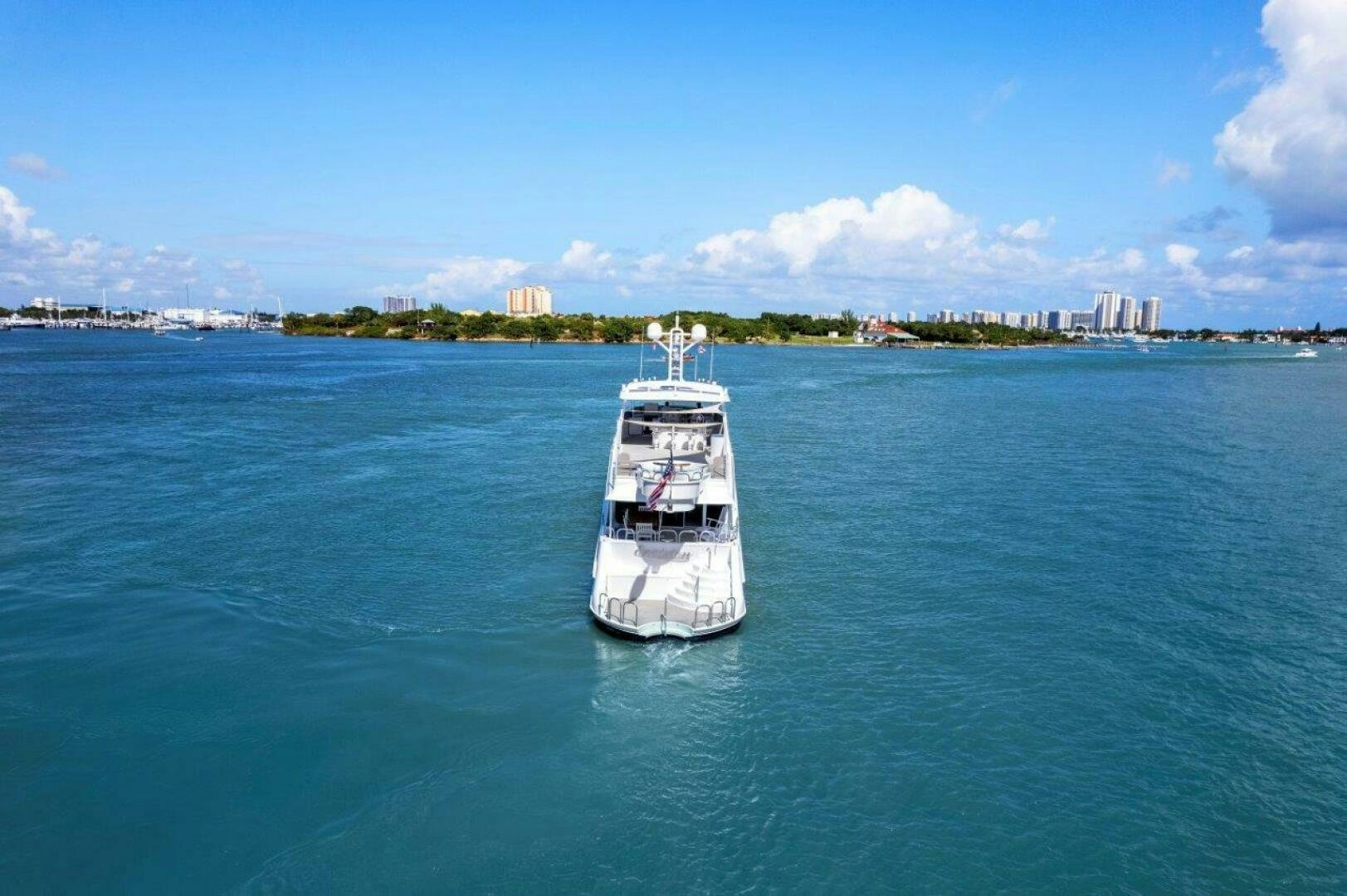a boat sailing on the water aboard ENVISION Yacht for Sale