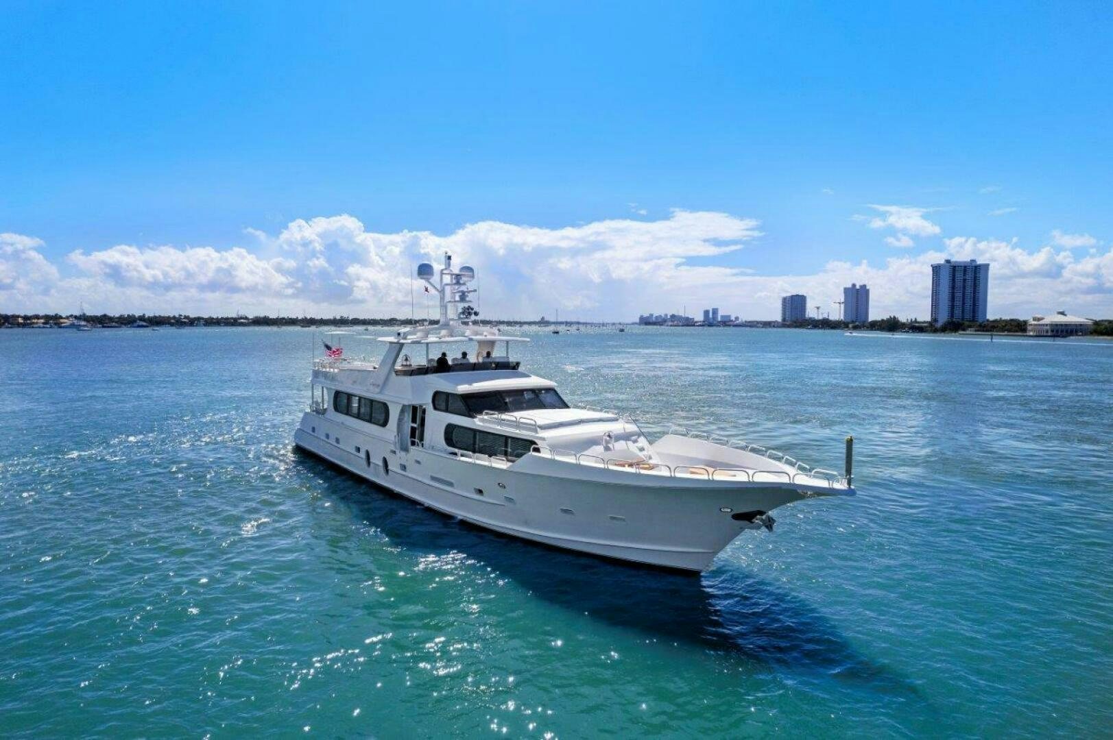 a white boat in the water aboard ENVISION Yacht for Sale