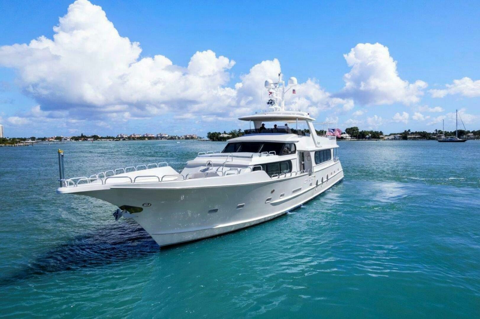 a white yacht in the water aboard ENVISION Yacht for Sale