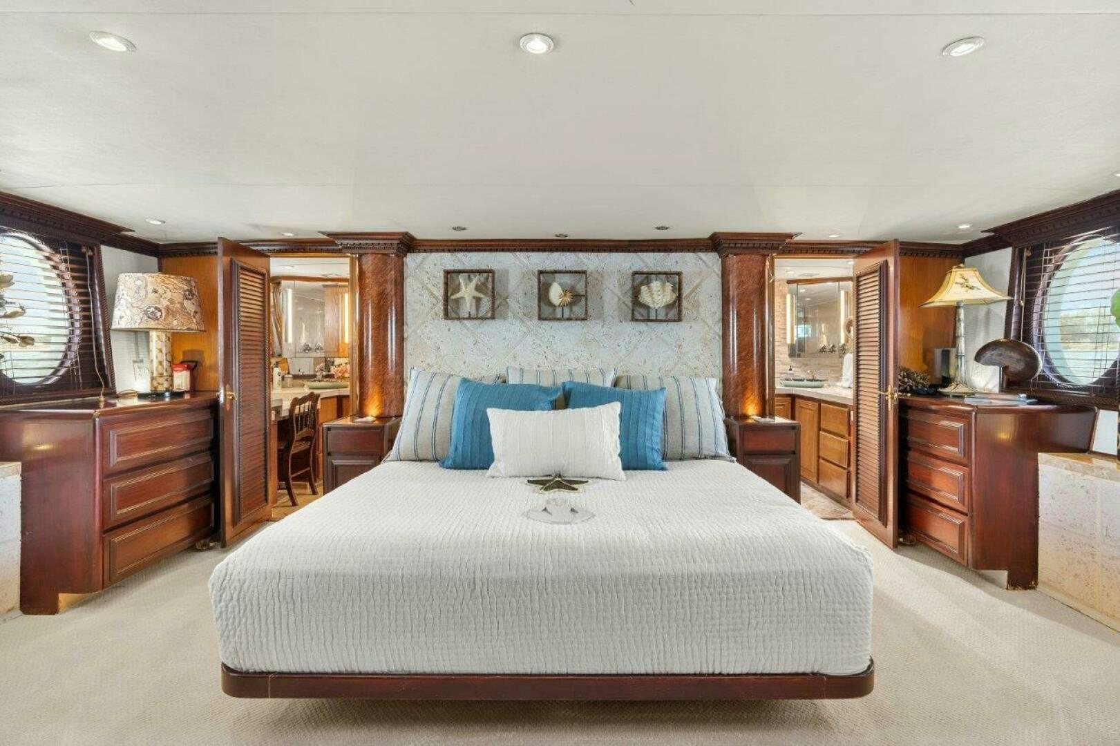 a bed in a hotel room aboard ENVISION Yacht for Sale