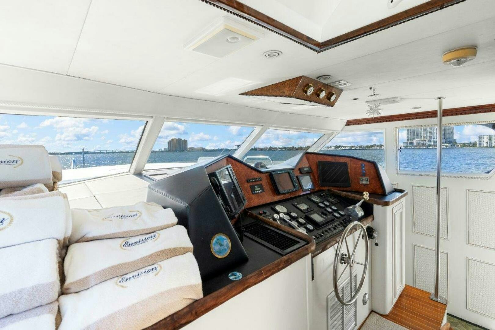 a small kitchen with a large window aboard ENVISION Yacht for Sale