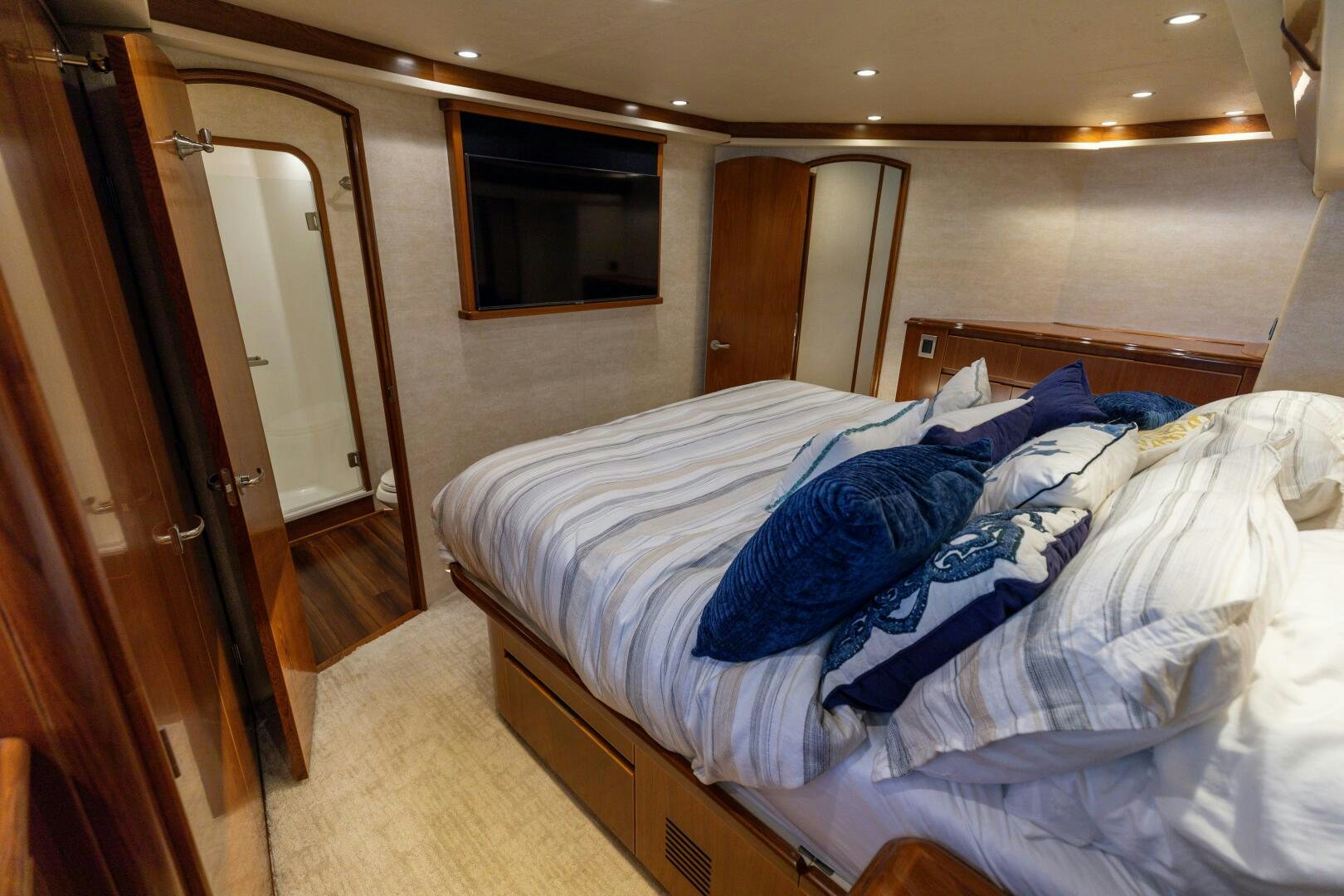 a bed with white sheets aboard SMOOTH RIDE Yacht for Sale