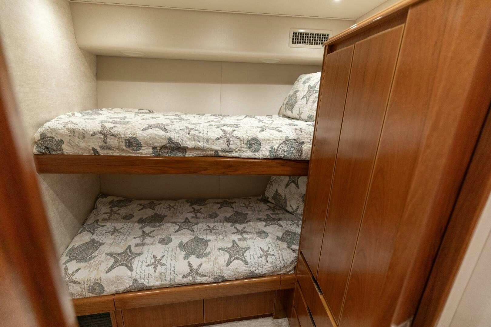 a wooden shelf with a mattress aboard SMOOTH RIDE Yacht for Sale