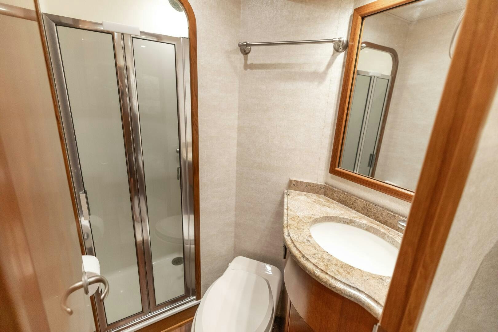 a bathroom with a sink and a shower aboard SMOOTH RIDE Yacht for Sale