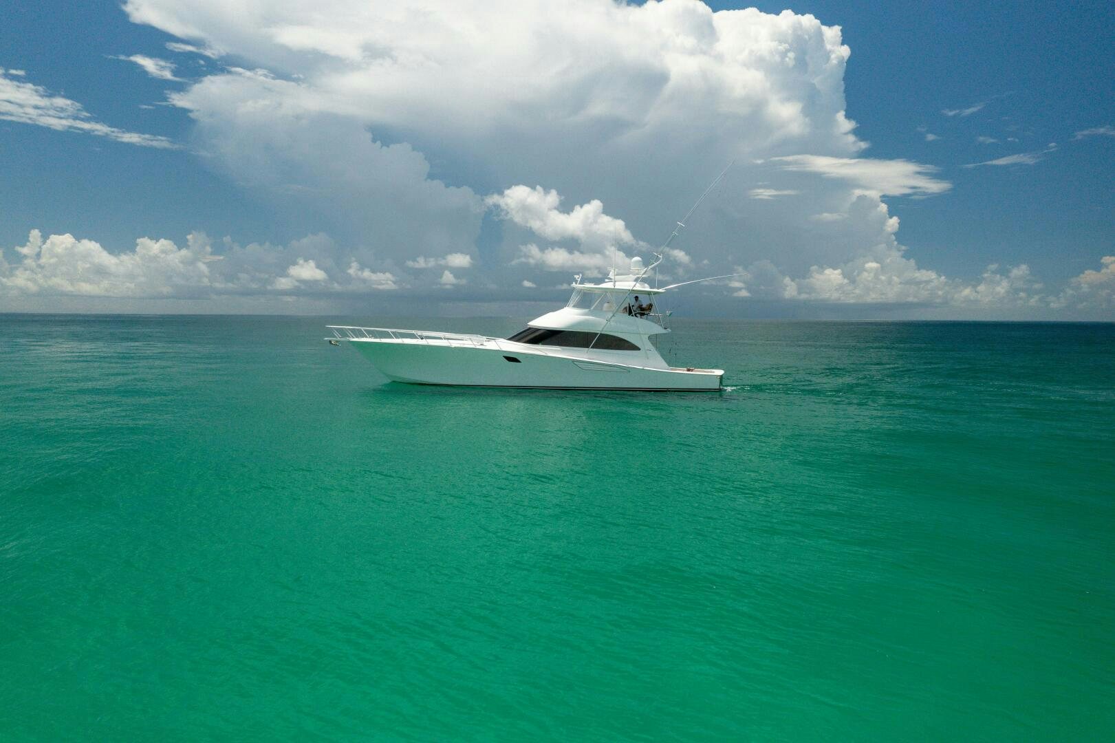 a white boat in the water aboard SMOOTH RIDE Yacht for Sale