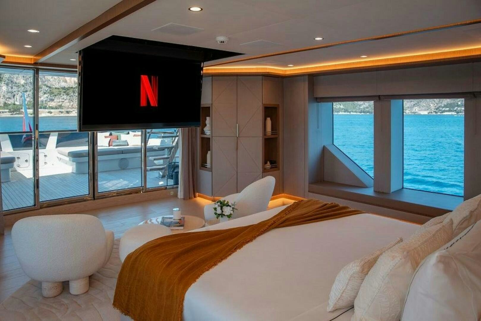 a large modern looking living room aboard INFINITY NINE Yacht for Sale