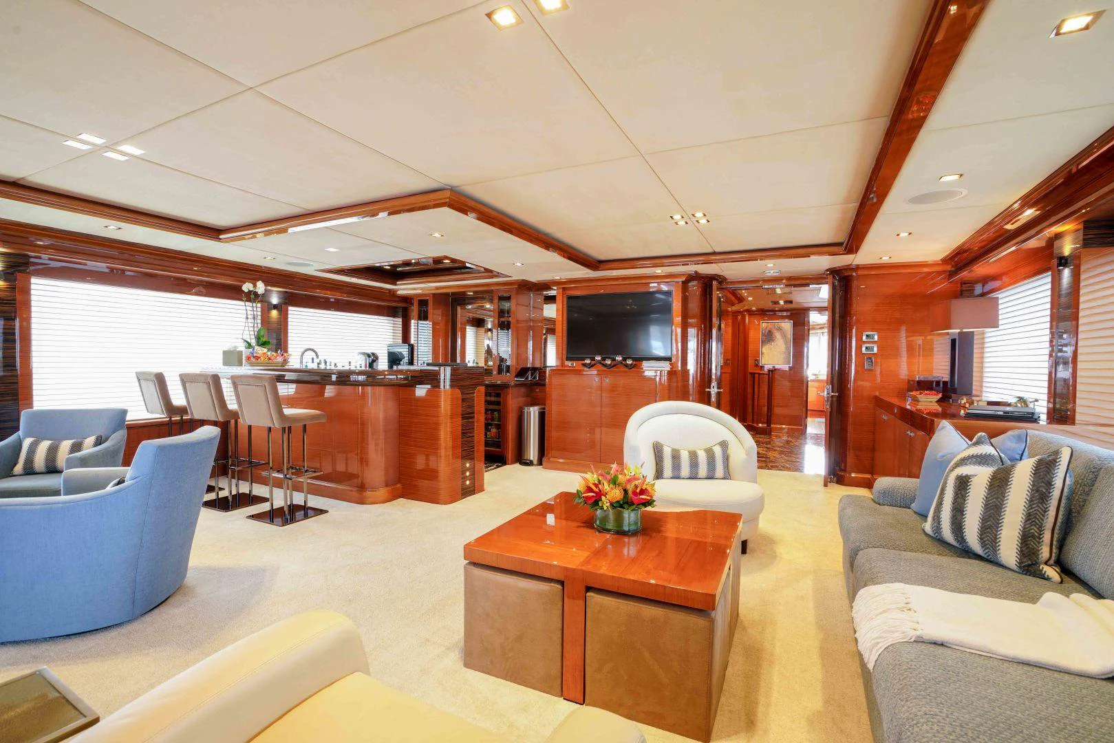 a living room with a table and chairs aboard ASPEN ALTERNATIVE Yacht for Charter