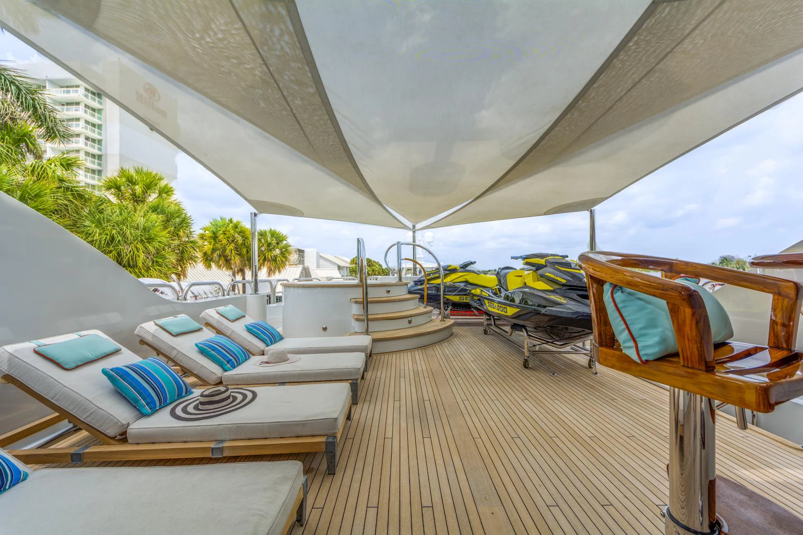 a tent with a deck and chairs aboard ASPEN ALTERNATIVE Yacht for Charter