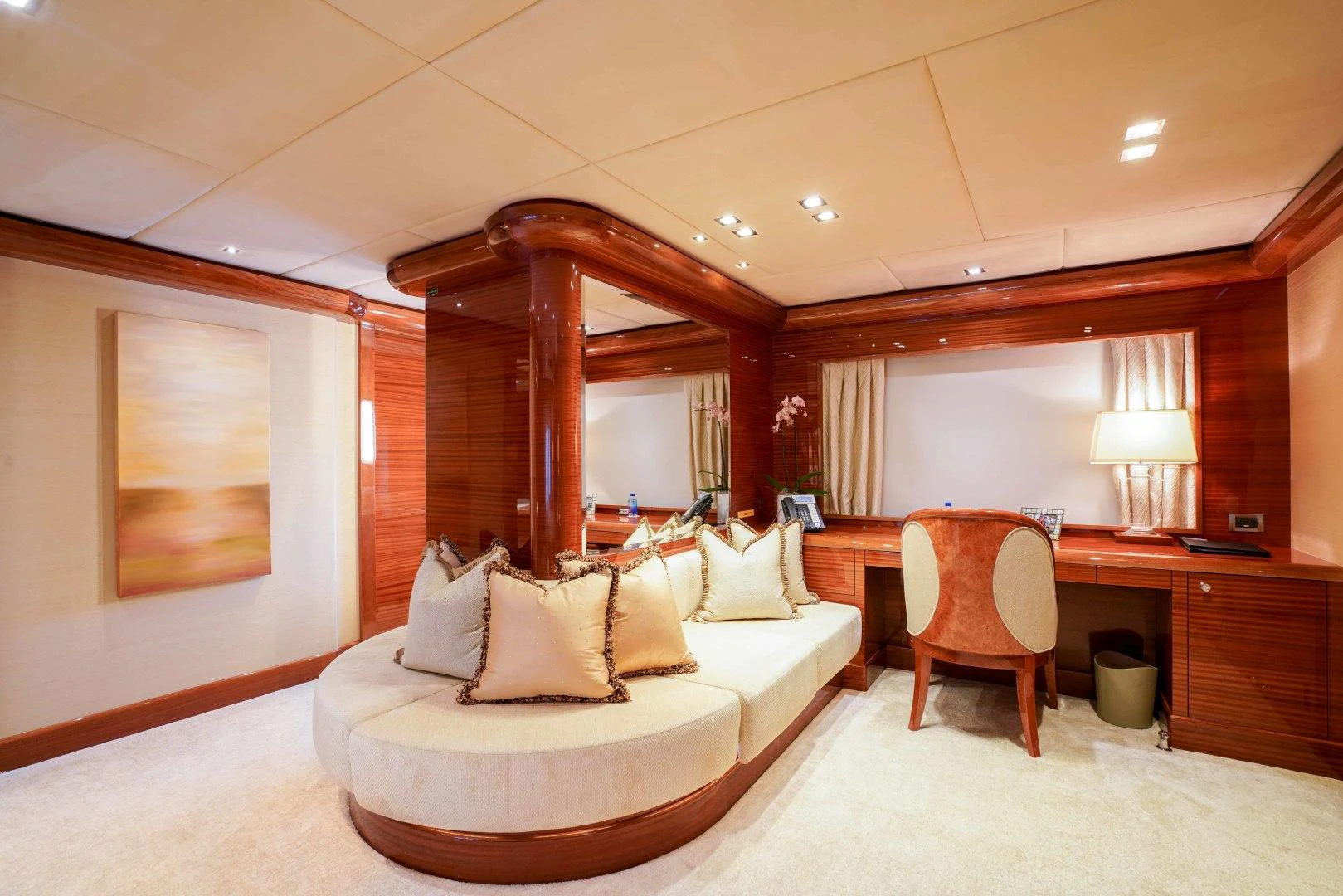 a room with a bed and a desk aboard ASPEN ALTERNATIVE Yacht for Charter