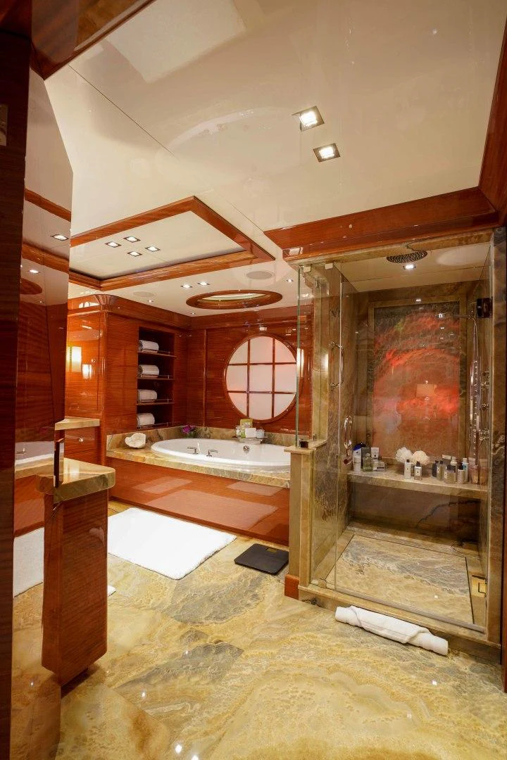 a bathroom with a large mirror aboard ASPEN ALTERNATIVE Yacht for Charter