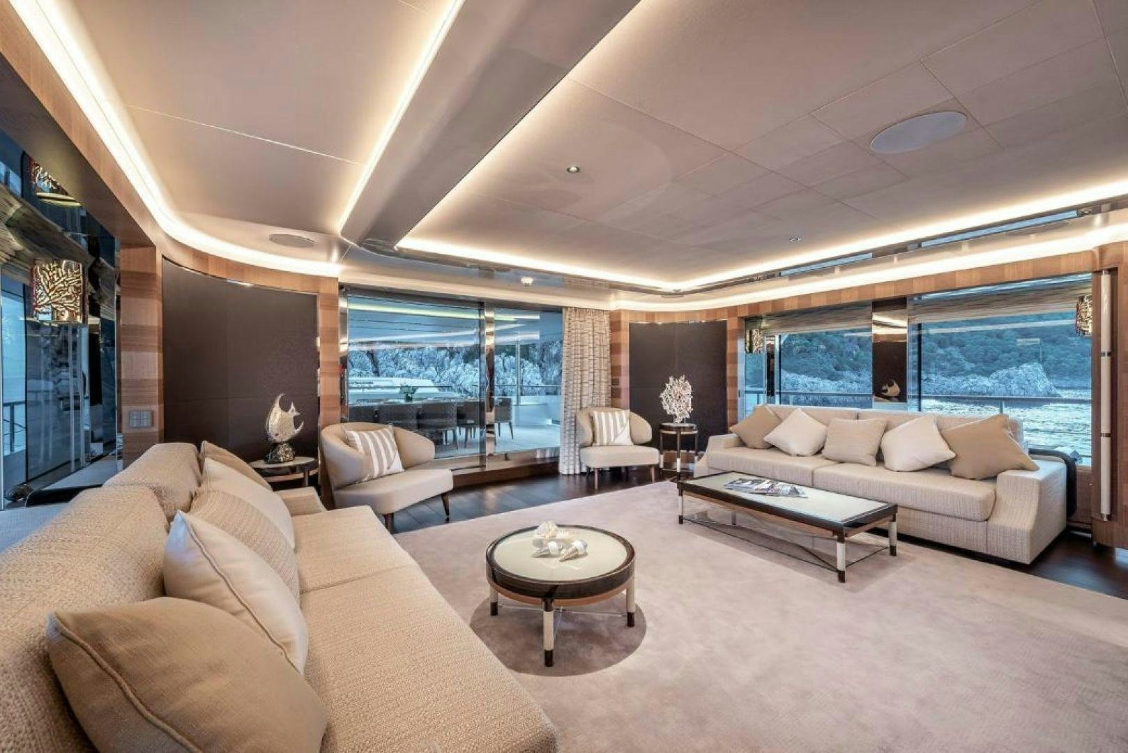 a living room with a large window aboard SUNRISE Yacht for Charter