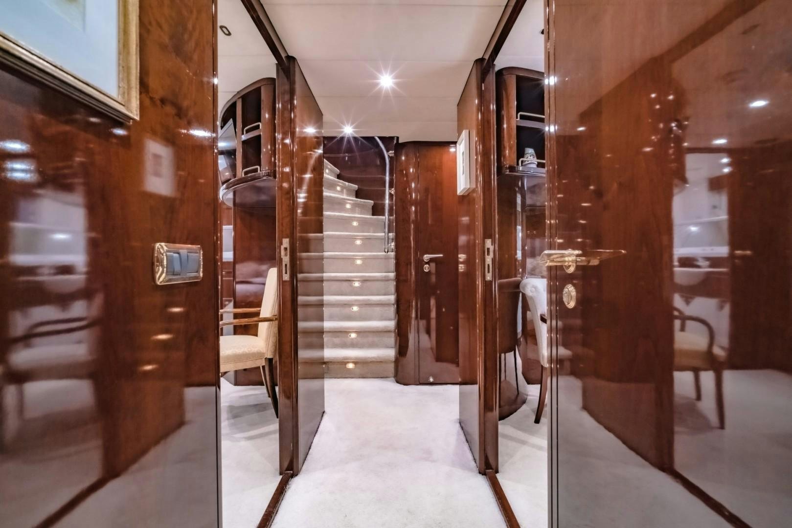 a hallway with wooden doors aboard XANADU OF LONDON Yacht for Sale