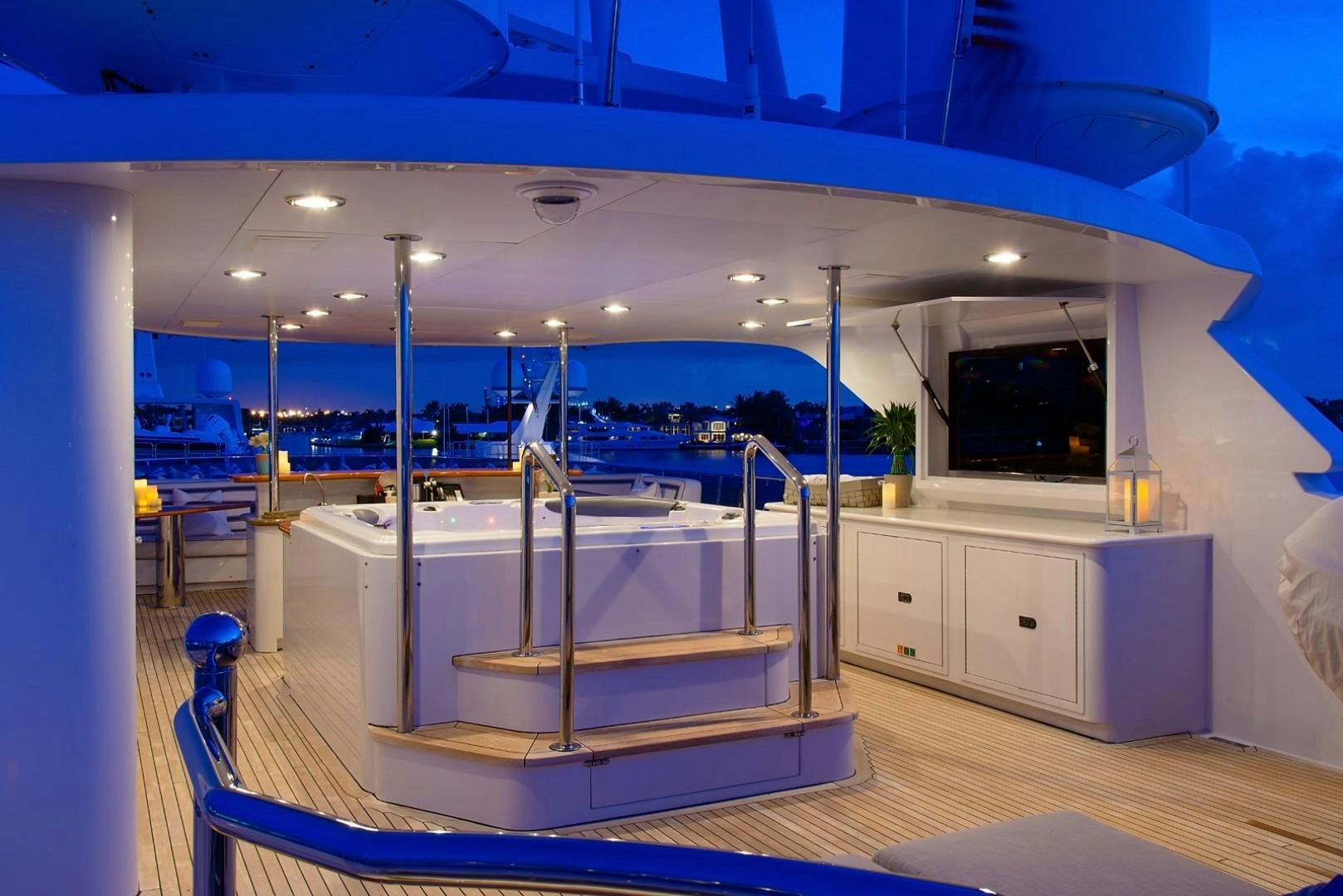 a large room with a pool table aboard FAR FROM IT Yacht for Charter